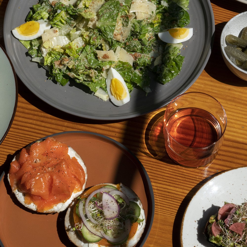 Sightglass Coffee dishes (Caesar Salad and Salmon Bagel) from Hollywood.